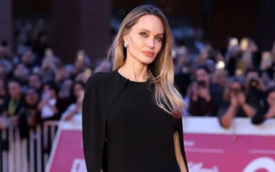 Angelina Jolie shows off new ink in daring black dress