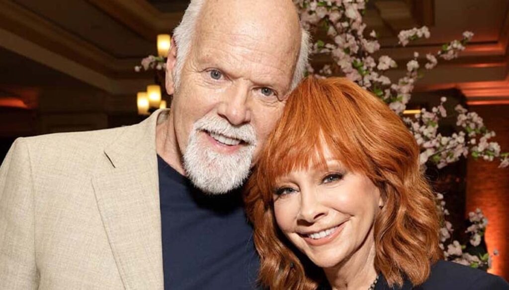 Reba McEntire puts marriage plans with Rex Linn on hold